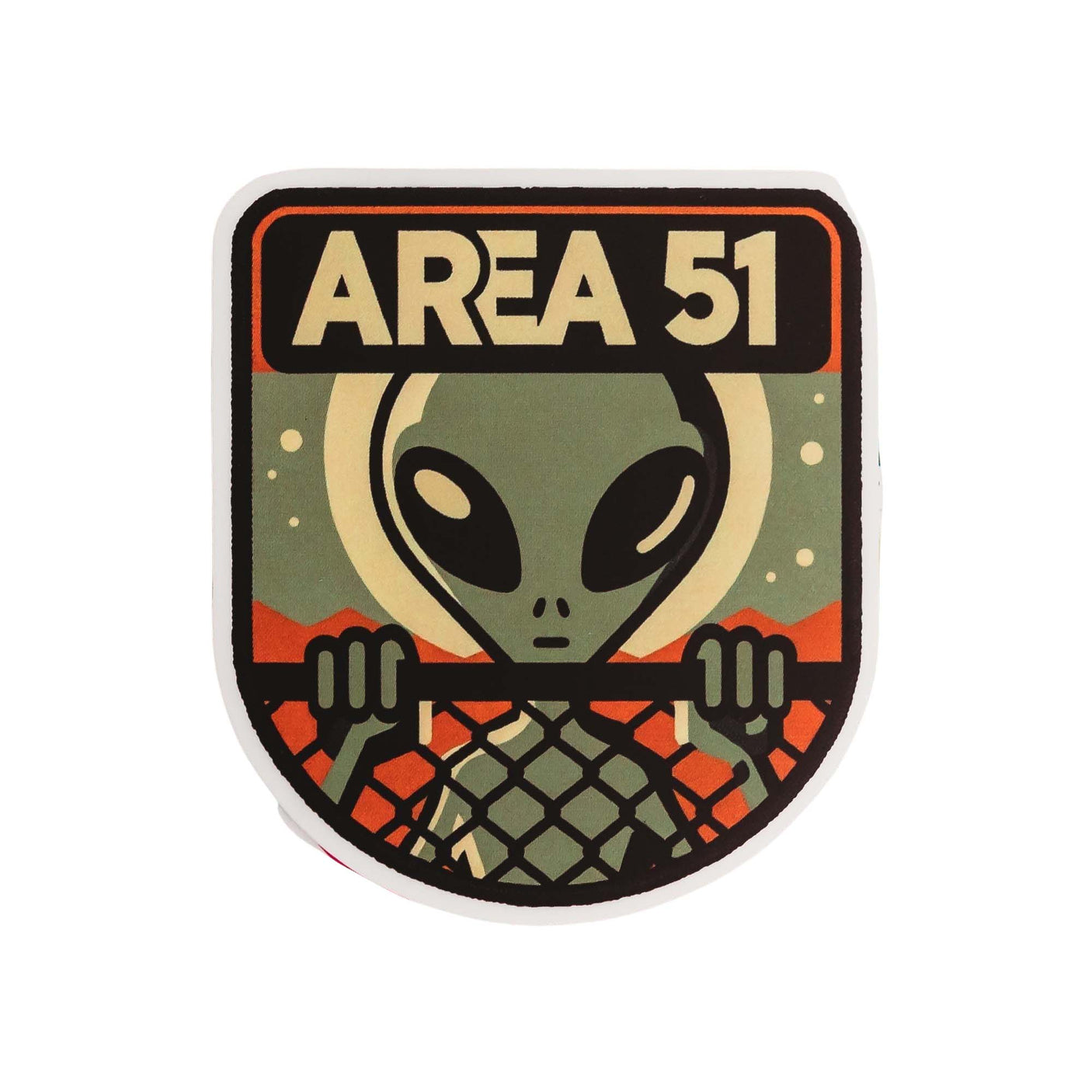 Area 51 sticker featuring a green alien holding a fence, with mountains and a retro design in the background.