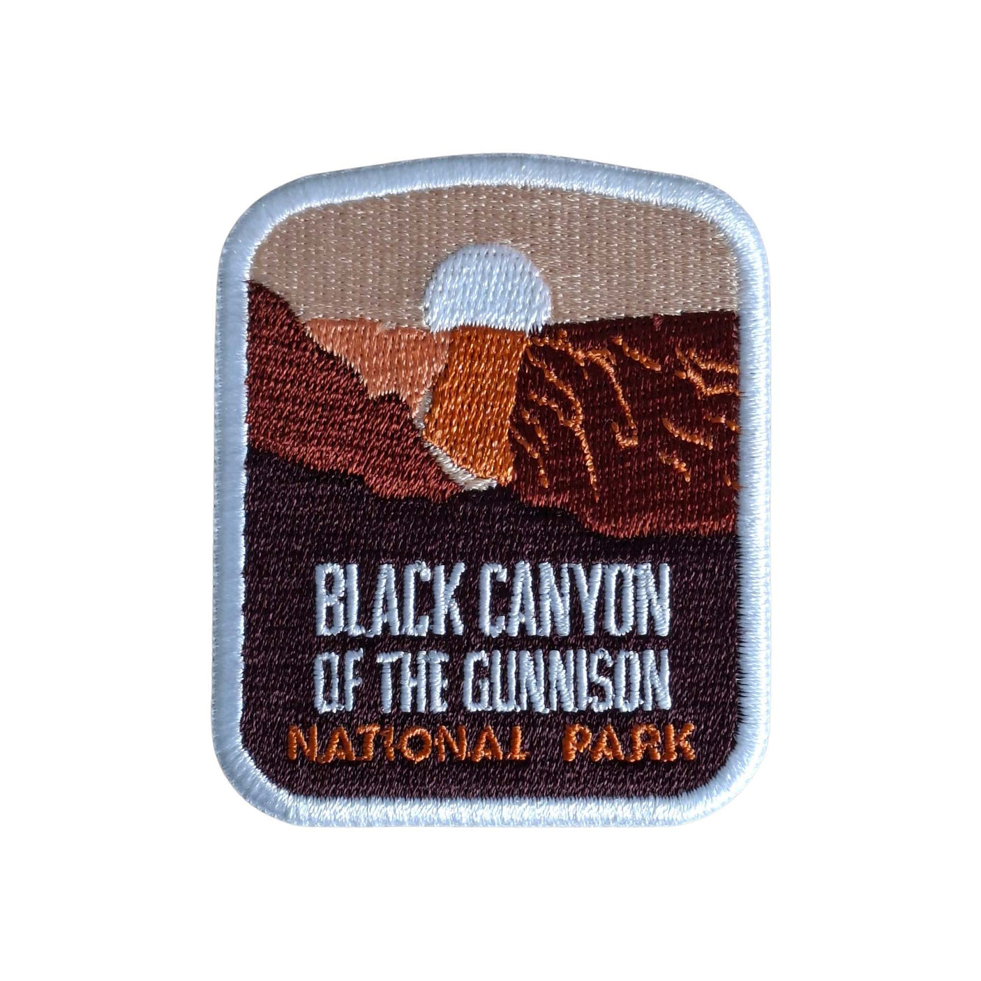 Black Canyon of the Gunnison National Park patch featuring a sunset over canyon cliffs with embroidered text.