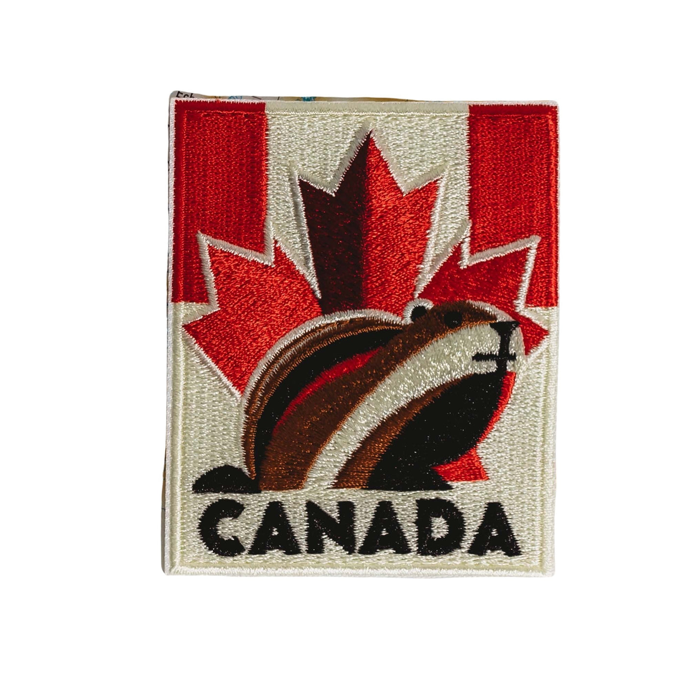 Canada patch featuring a beaver and a red maple leaf on a white background.