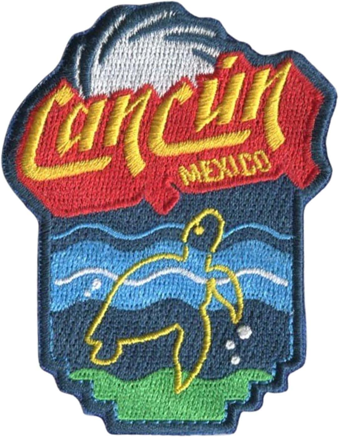 Cancun patch featuring a turtle design, with red "Cancun" text and blue waves below.