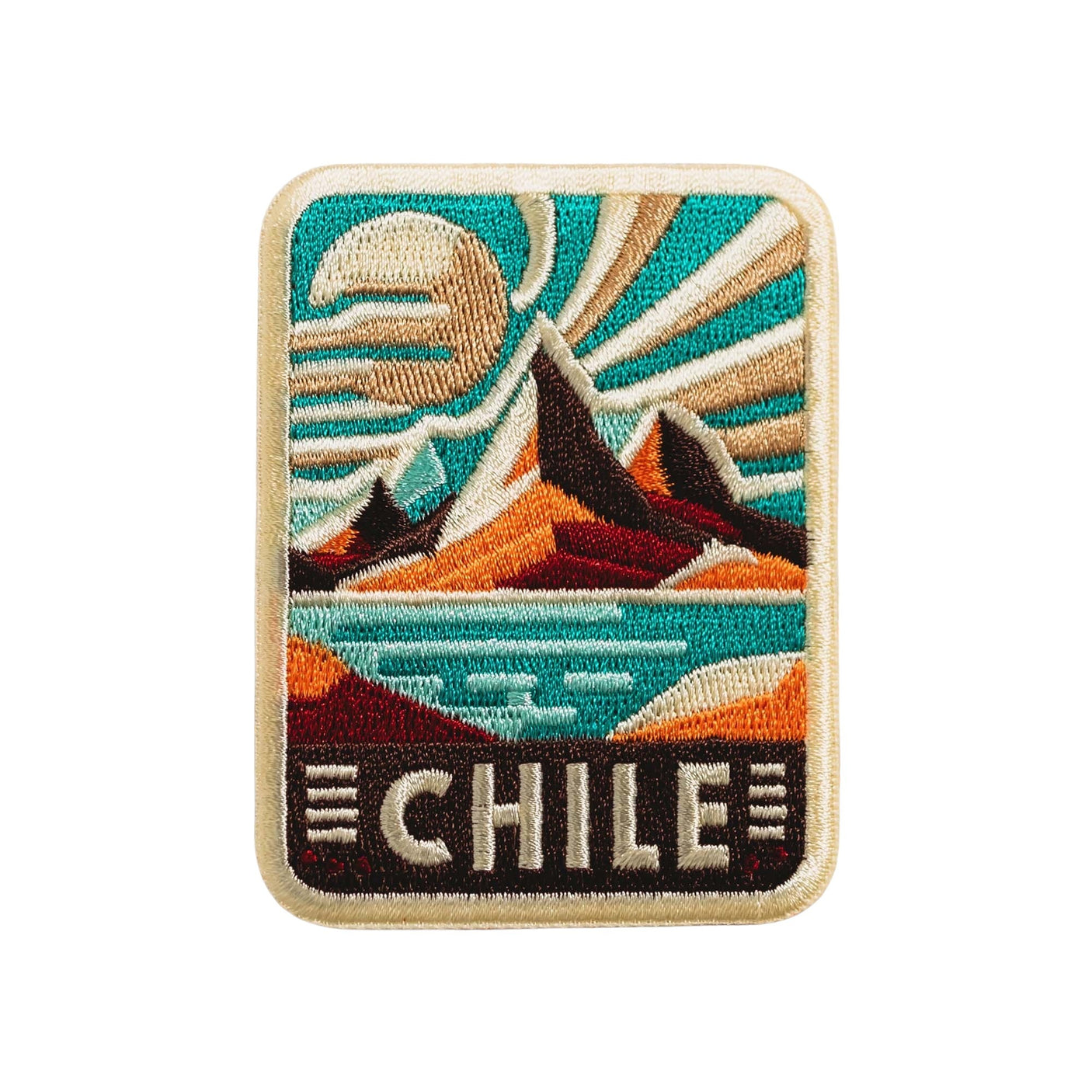 Chile patch featuring mountains, water, and sun in vibrant colors with a retro design.