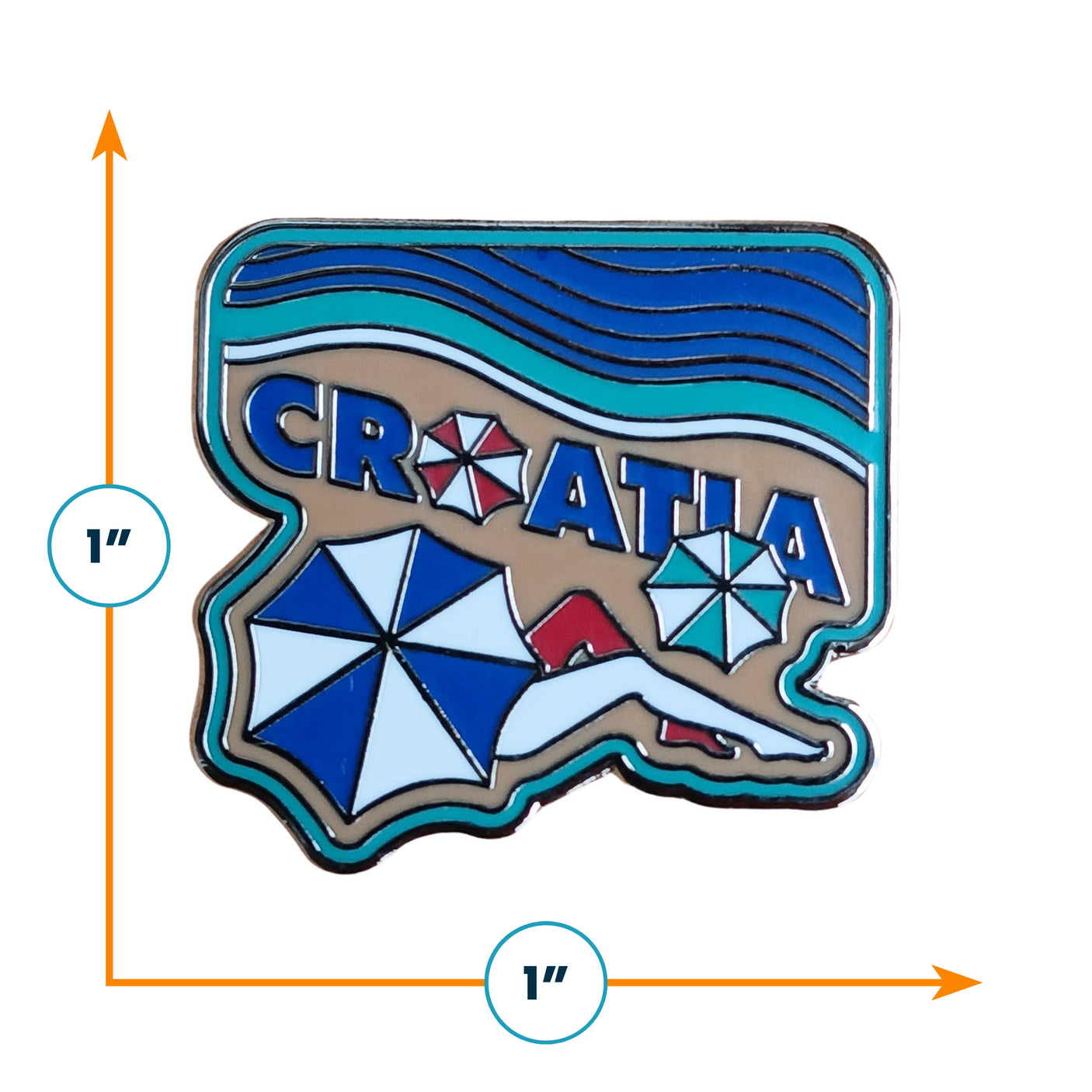 Croatia enamel pin featuring a beach scene with umbrellas and the word "Croatia" in colorful letters.