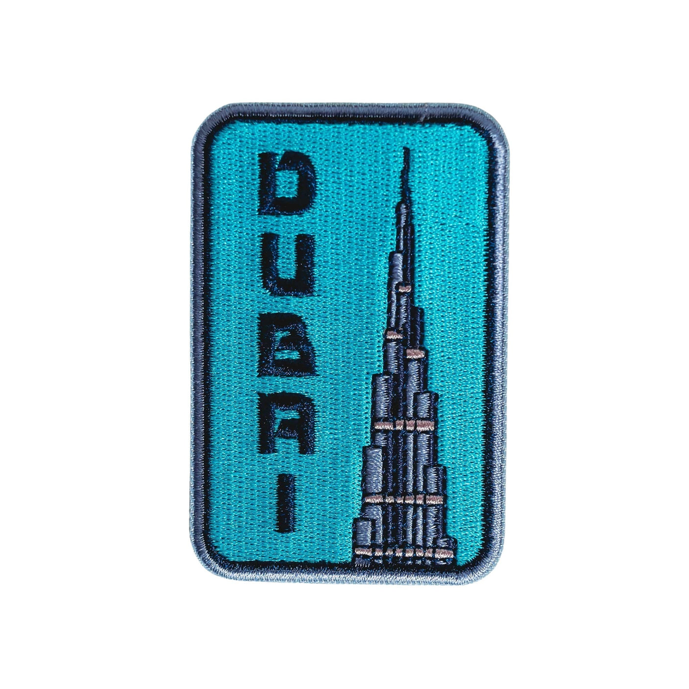 Dubai patch featuring the Burj Khalifa in blue and silver embroidery on a rectangular background.
