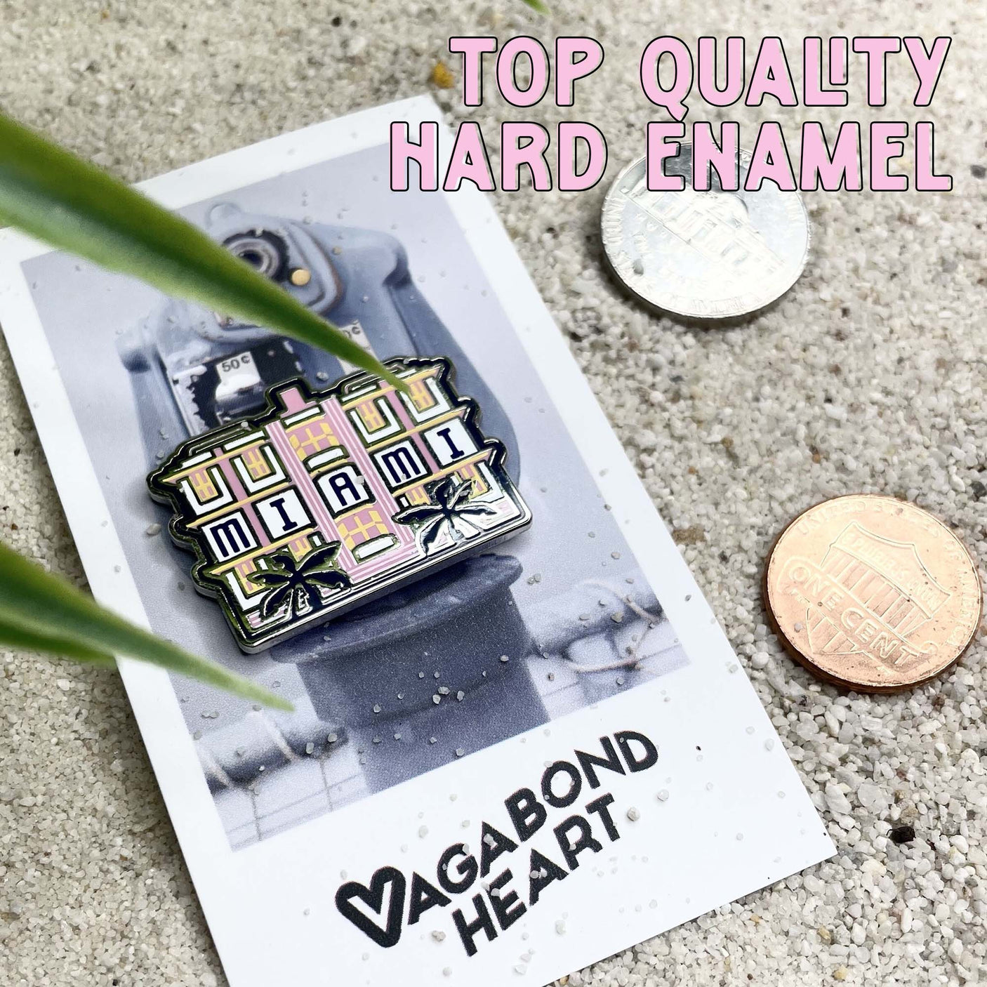 Philadelphia enamel pin featuring a colorful design with palm trees and the word "MIAMI" on a card background.