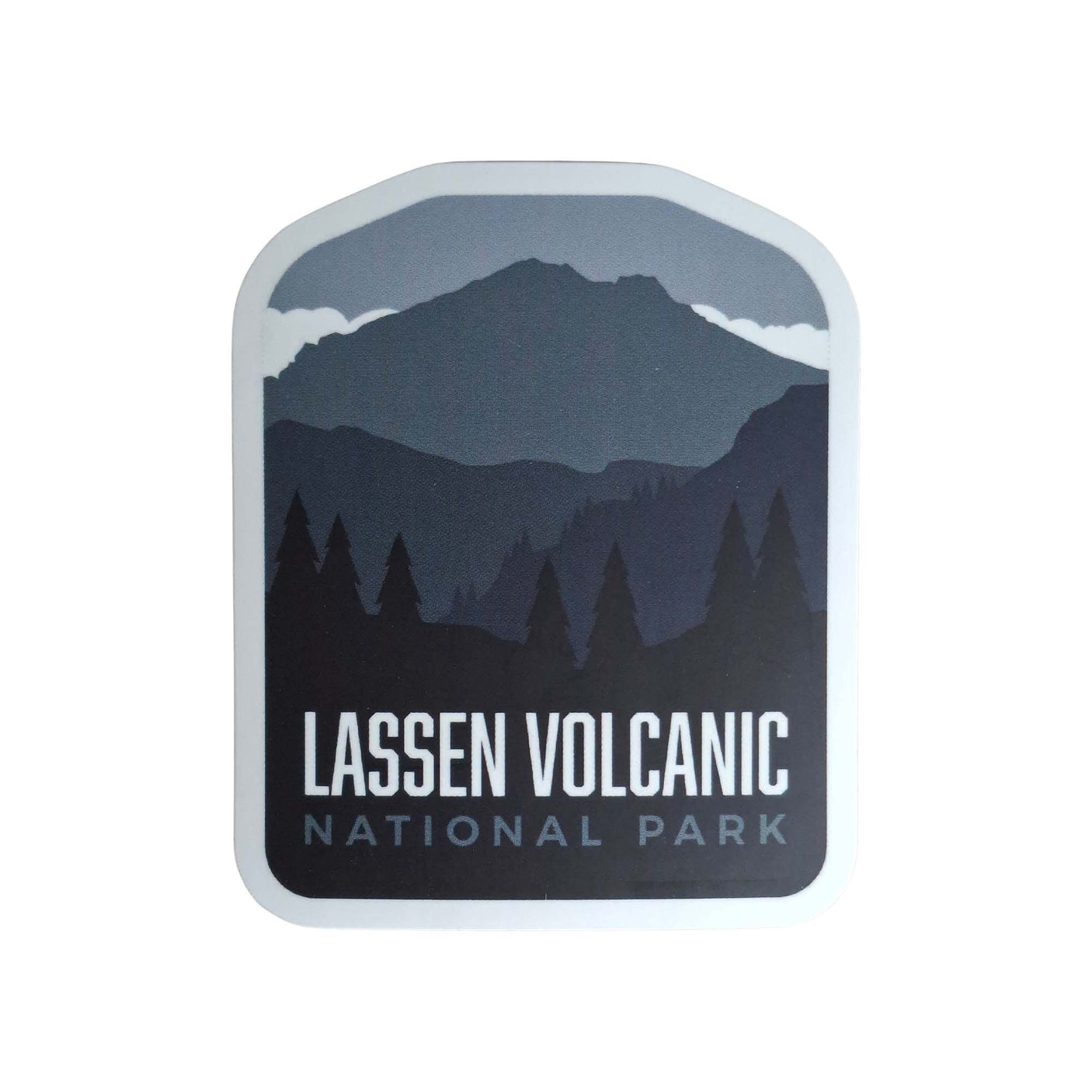 Lassen Volcanic National Park sticker featuring a mountain silhouette and pine trees in gray and black colors.