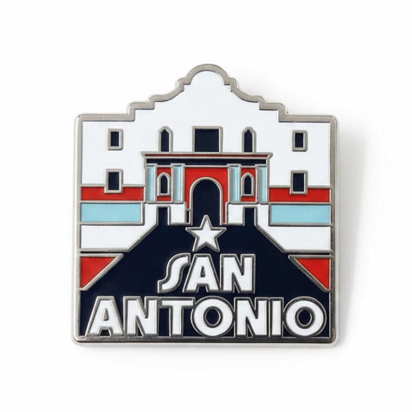 San Antonio pin featuring a stylized design with red, white, and blue colors, depicting a historic building and star.