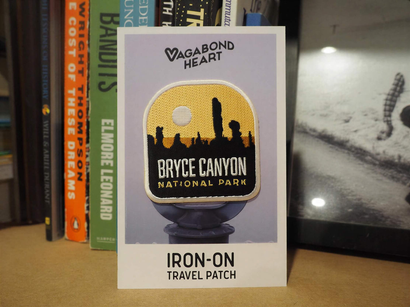 Bryce Canyon National Park patch on a backing card featuring yellow and black colors with silhouette design.