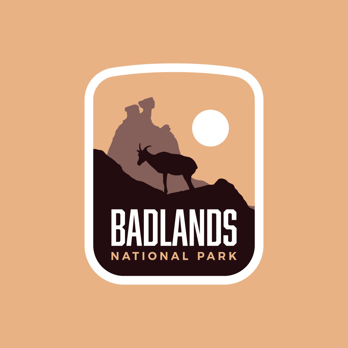 Badlands National Park sticker featuring a silhouette of a goat against a tan background with rock formations and sun.