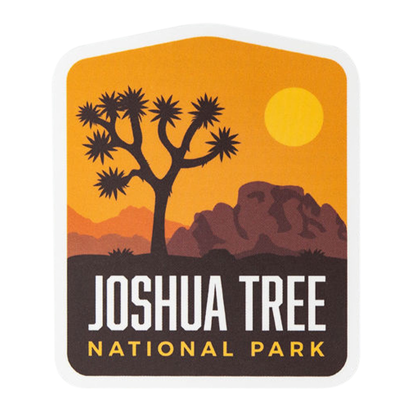 Joshua Tree National Park sticker featuring a silhouette of a tree and mountains against an orange sunset background.