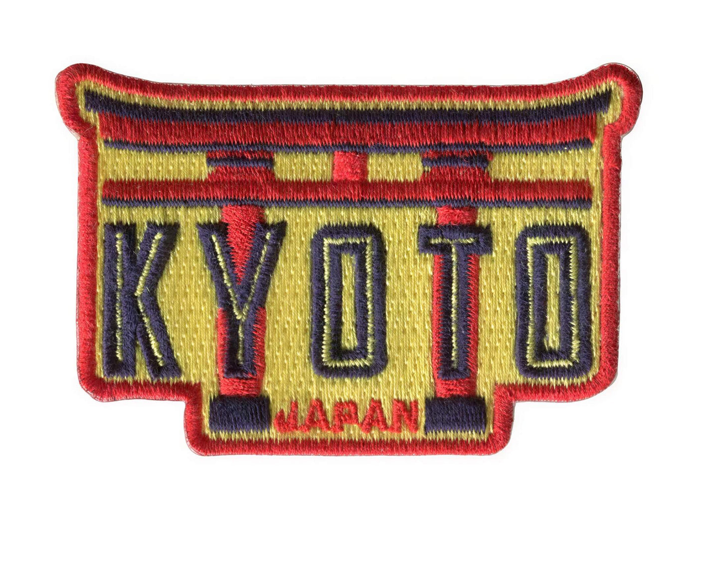 Kyoto Japan patch featuring bold lettering in red and blue on a yellow background with a traditional gate design.