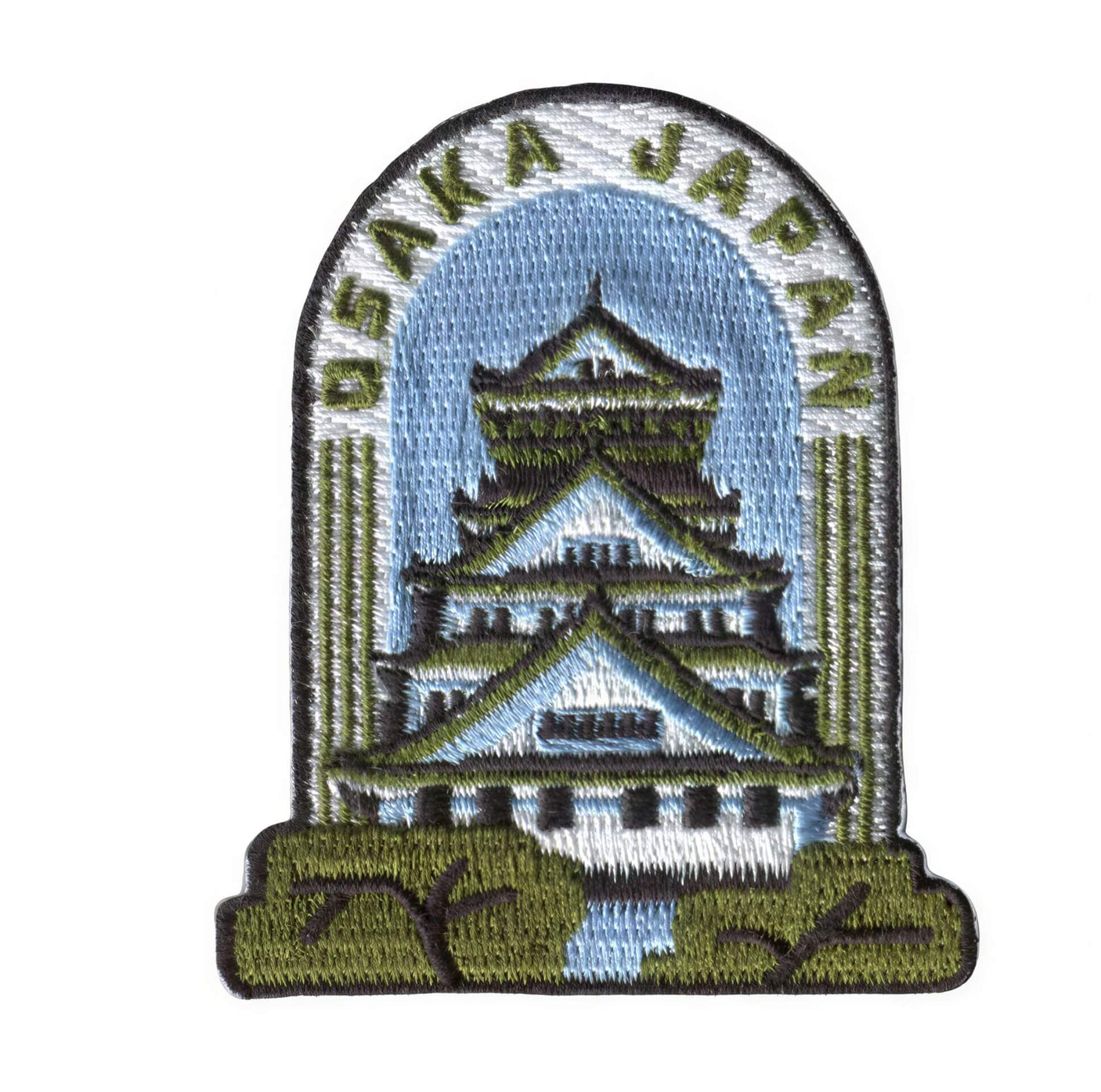 Osaka Japan patch featuring a castle design with blue sky and green trees, embroidered on a fabric background.