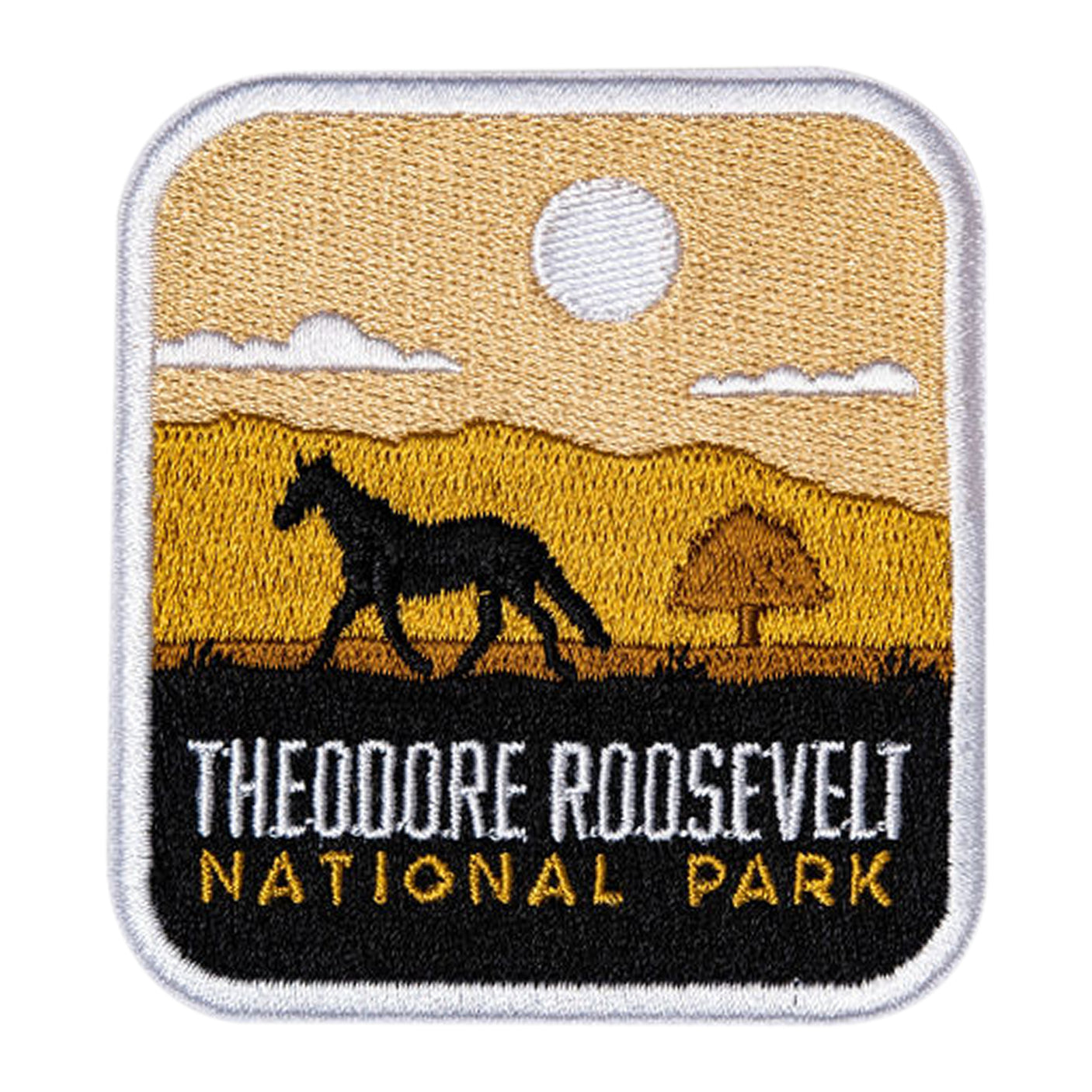 Theodore Roosevelt National Park patch featuring a horse silhouette against a sunset landscape with mountains.