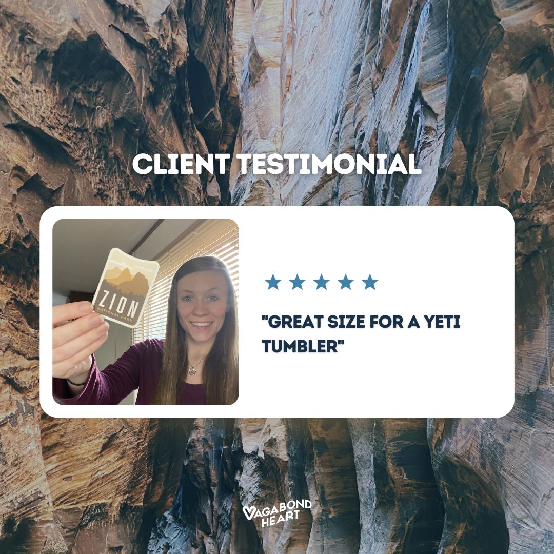 Zion National Park sticker held by a person, featuring mountain graphics and the word "ZION" in bold letters.