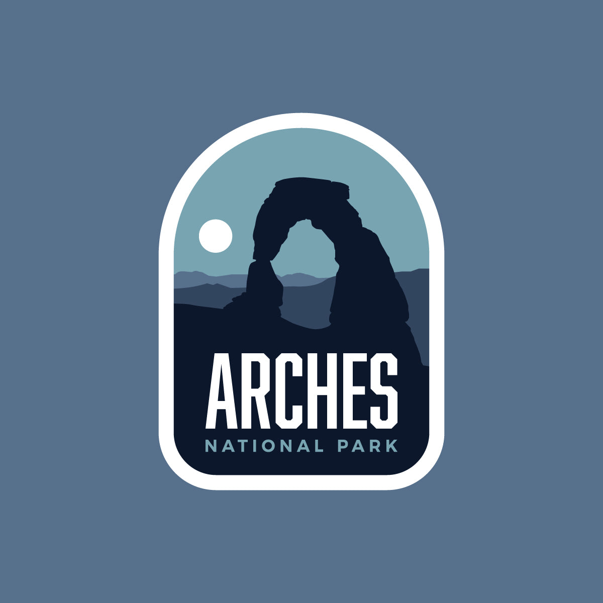 Arches National Park patch featuring a blue background and the Delicate Arch silhouette with mountains.