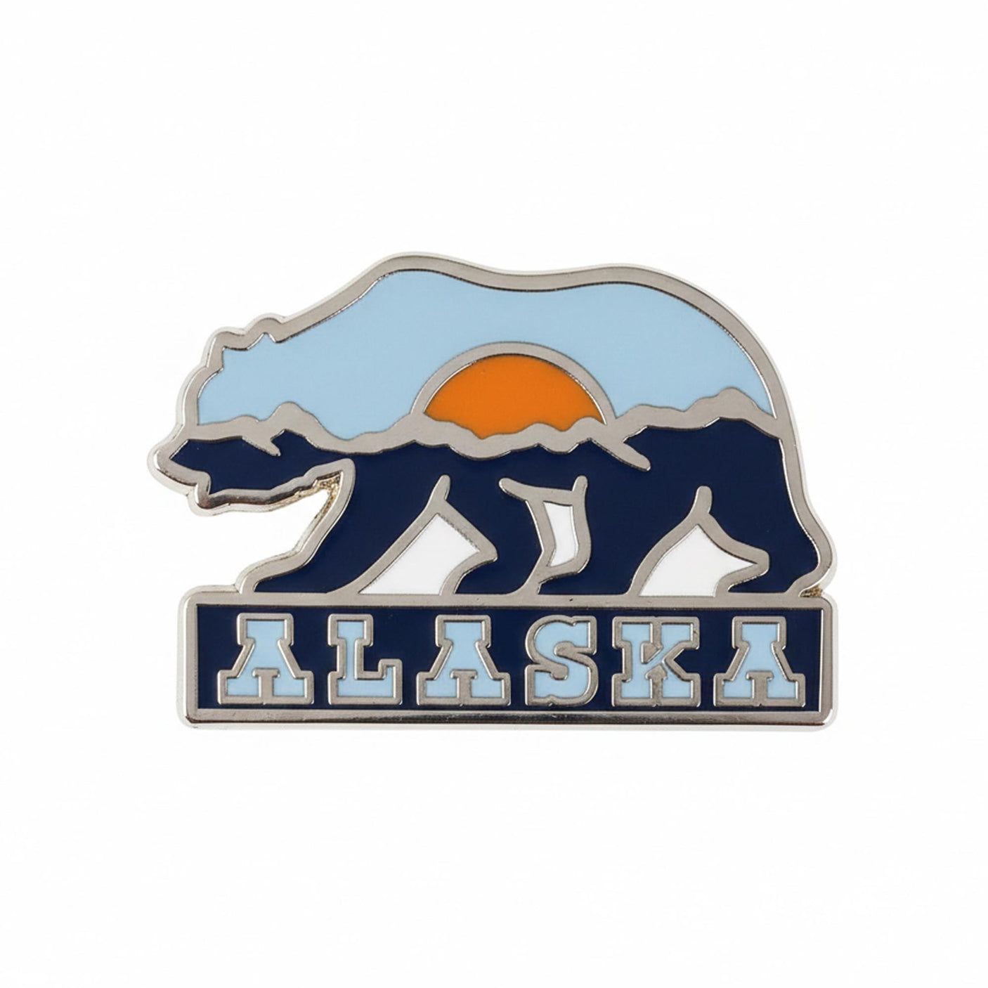 Alaska enamel pin featuring a bear silhouette, mountains, and a sunset in blue, orange, and white colors.