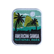 American Samoa National Park patch featuring palm trees, mountains, and a sun against a teal and black background.