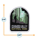 Cuyahoga National Park patch featuring a hiker among trees, with a moonlit background, measuring 2.75 by 2.25 inches.