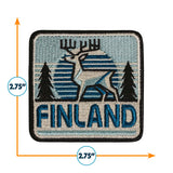 Embroidered patch with a reindeer and trees design, featuring the word 'FINLAND', with dimensions indicated.