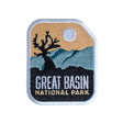 Great Basin National Park patch featuring a silhouette tree, mountains, and a sunset background.