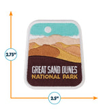 Great Sand Dunes National Park patch featuring tan and brown embroidered dunes with a blue sky and sun.