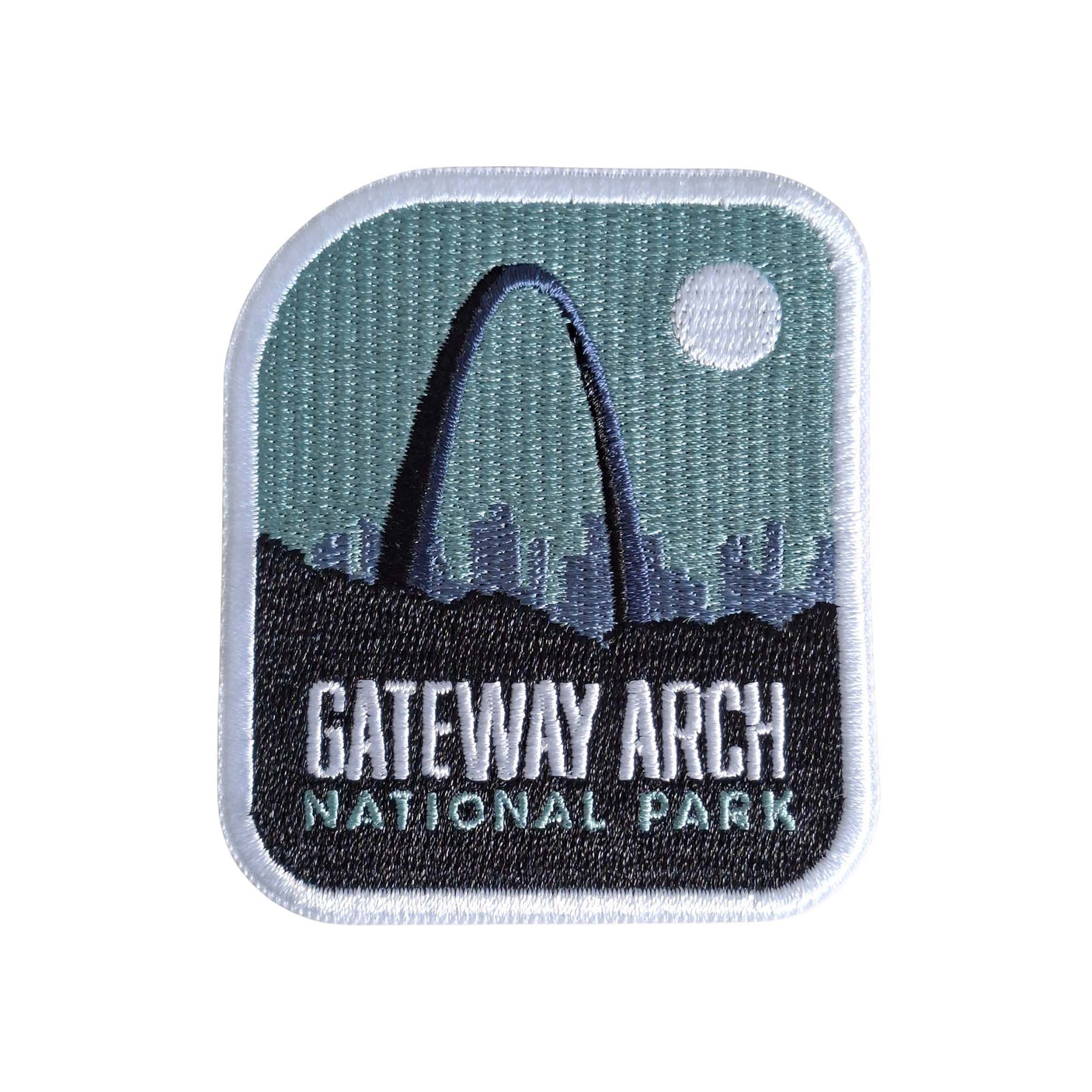 Gateway Arch National Park patch featuring an arch silhouette against a teal background with a white moon.