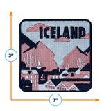 Iceland patch featuring a landscape design with mountains, trees, and buildings in pastel colors, measuring 3 inches by 3 ...