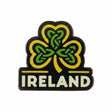 Ireland enamel pin featuring a green and yellow shamrock design with the word "IRELAND" in white text below.