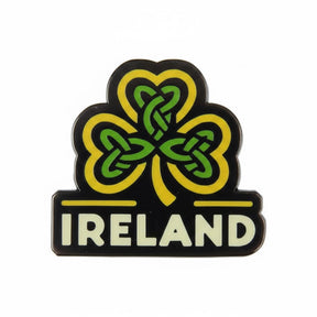 Ireland enamel pin featuring a green and yellow shamrock design with the word "IRELAND" in white text below.