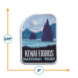 Kenai Fjords National Park patch featuring blue and purple mountains, water, and a moon, measuring 2.75 inches by 2 inches.