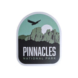 Pinnacles National Park sticker featuring green mountains, a bird silhouette, and bold text on a white background.