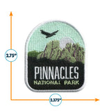 Pinnacles National Park patch featuring mountains, a sun, and an eagle, measuring 2.75 inches by 2.375 inches.
