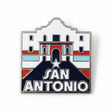 San Antonio pin featuring a stylized design with red, white, and blue colors, depicting a historic building and star.