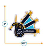 Scotland patch featuring a bagpipe design with blue and yellow accents, measuring 3.25 inches wide by 3 inches tall.