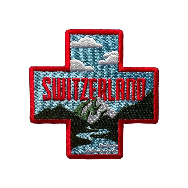 Switzerland patch featuring a red cross, mountains, and clouds with "SWITZERLAND" text in bold red.