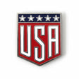 USA pin with a red shield design, featuring white letters and five stars in blue at the top.