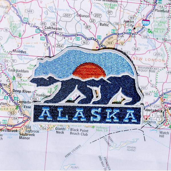 Alaska patch on a map background