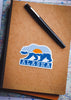 Alaska sticker on a notebook