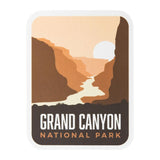 Grand Canyon National Park sticker featuring a sunset over canyon cliffs and a river, with warm earth tones.
