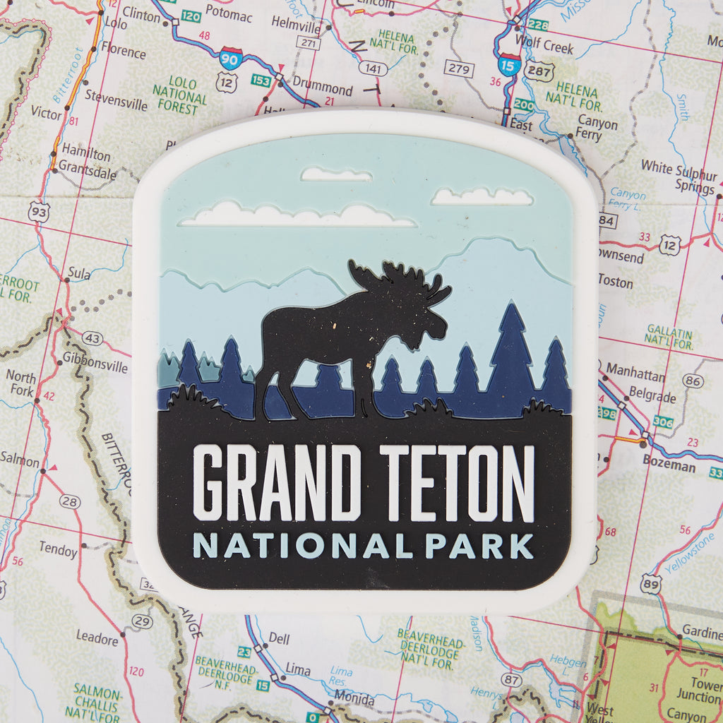 Grand Teton fridge magnet on a map background