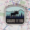Grand Teton pin on a map background