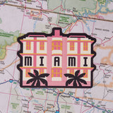 Miami sticker on a map background