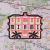 Miami sticker on a map background