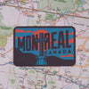 Montreal sticker on a map background