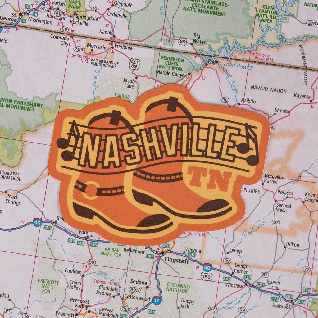 Nashville sticker on a map background