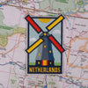 Netherlands patch on a map background