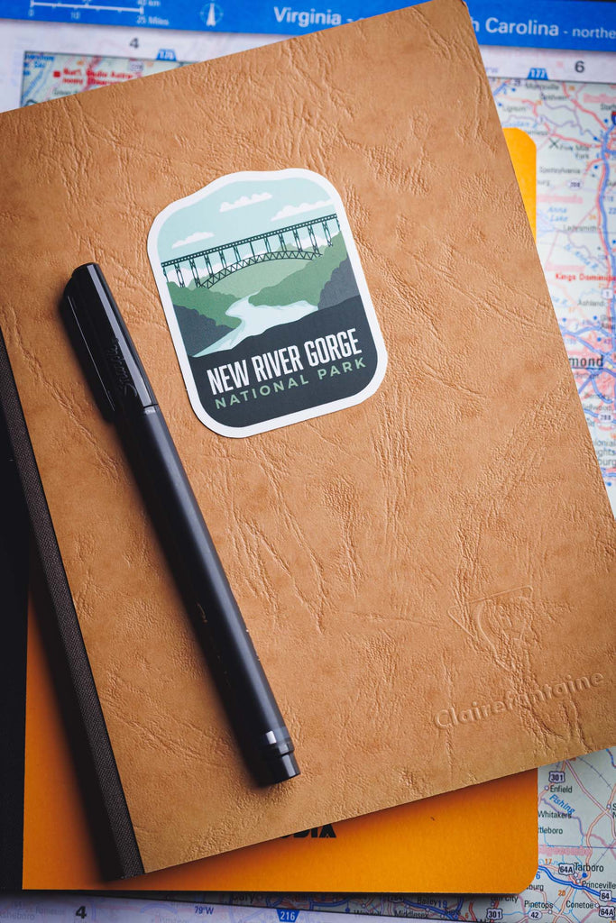 New River Gorge sticker on a notebook