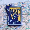 New York City Fridge Magnet on a map background