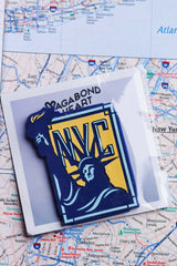 New York City fridge magnet on a map