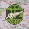 New Zealand Sticker on a map background