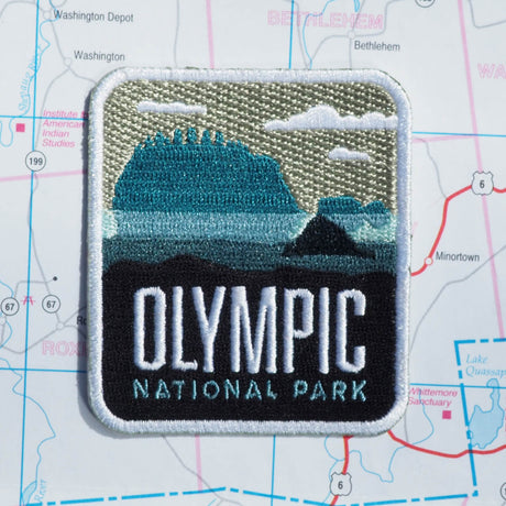Olympic patch on a map background